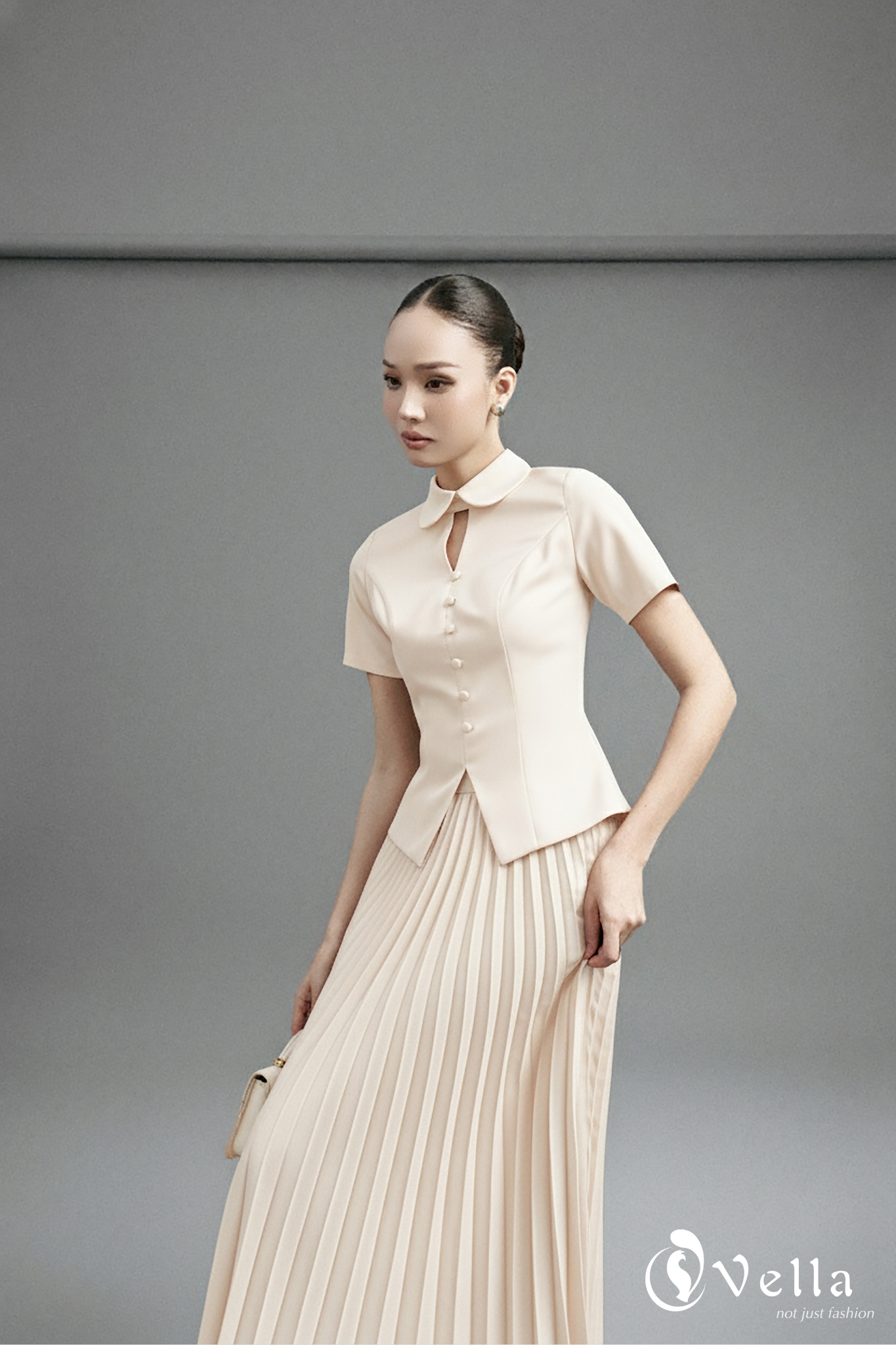 LINA set – áo peplum cổ tròn ngắn tay màu kem VA25084